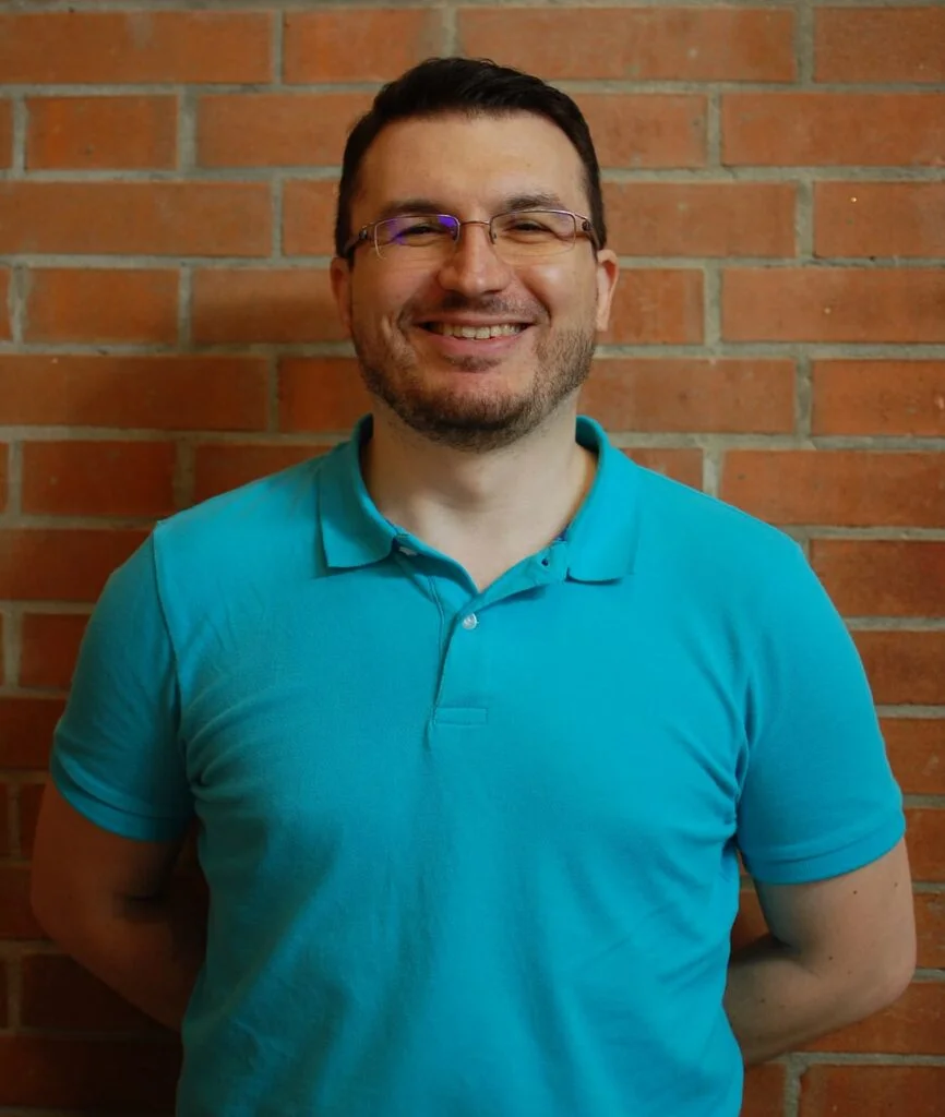Matteo Greco, WordPress developer, consultant and team lead, smiling at the camera